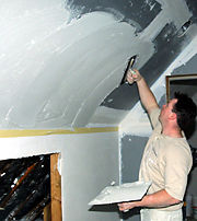 Plastering a curved ceiling.Plaster professionals from Connecticut.  Interior skim coat, conventional, venetian and repair.